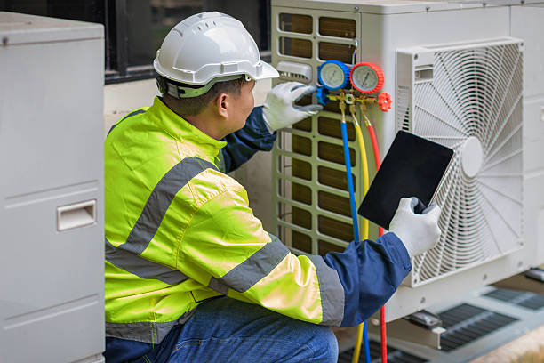 Professional Hvac technician working in Hampton Bays, NY